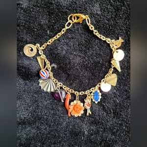 Gold tone Charm Bracelet with mixed charms